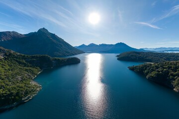 Aerial view of Lopez Bay with lush vegetation and crystal-clear water in Bariloche, Argentina