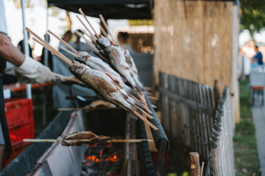 fish grilled on a stick