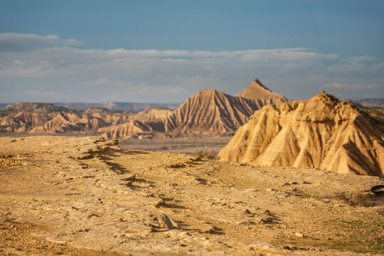 Majestic view of rough mountainous cliffs located in bad land terrain in Bardenas Reales in Navarra Spain