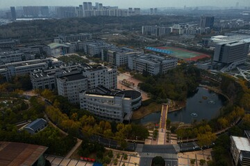 Aerial view of Wuhan's cityscape with a campus in deep winter