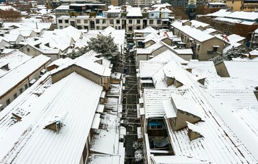 Aerial shot of buildings covered in snow in Wuhan, China.