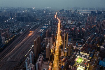 Aerial shot of the cityscape of Wuhan at nighttime, China.