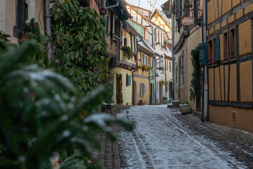 Charming Street with Old Houses in Beautiful village Eguisheim, in christmas time, Alsace, France