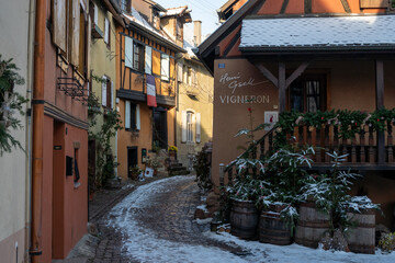 Charming Street with Old Houses in Beautiful village Eguisheim, in christmas time, Alsace, France