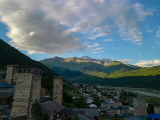 Obraz premium Aerial view of an old stone Mestia tower in a picturesque mountain village