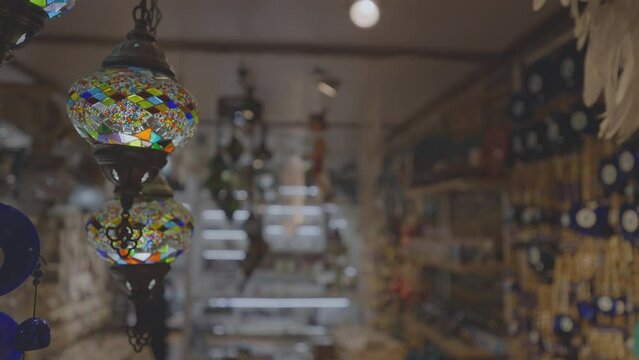 Asian souvenir shop interior with knick knack and decor things. Traditional tourism business concept.