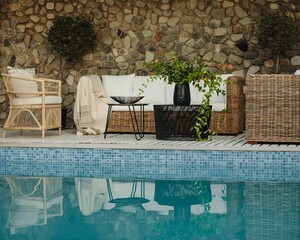 Beautiful view of an outdoor furniture next to the pool