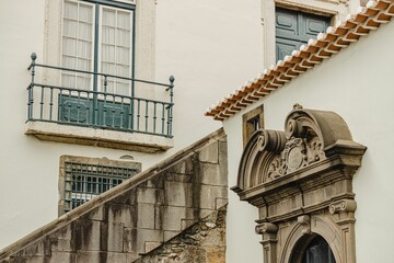 Low angle shot of layered historic stone buildings in  Funchal, Madeira Island, Portugal