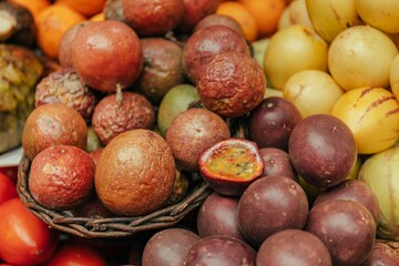 Closeup of a selection of fresh and ripe fruits of various types and colors