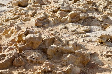 Beach with sandy shore and rocky outcroppings