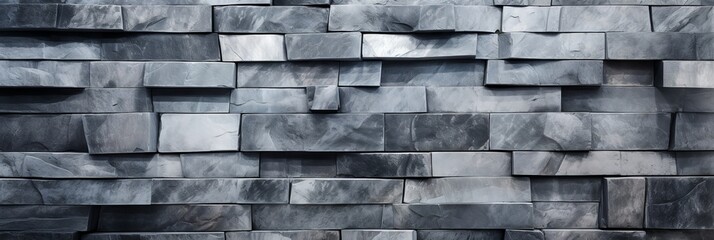 Grey stone wall with different sized stones, modern siding