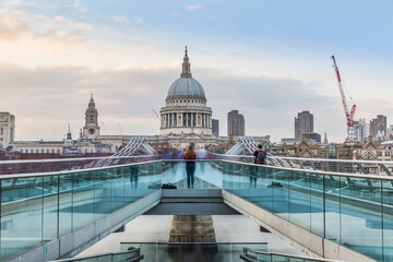 St Paul's Cathedral and the Millennium Bridge in London - obrazy, fototapety, plakaty