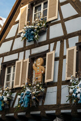 Kayserberg village at Christmas time in winter with Christmas decorations on the houses, Alsace, France.