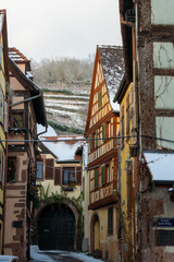 Kayserberg village at Christmas time in winter with Christmas decorations on the houses, Alsace, France.
