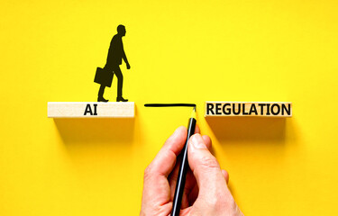 AI regulation symbol. Concept words AI artificial intelligence regulation on beautiful wooden...