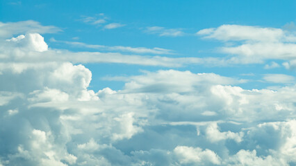 blue sky and clouds close up view from below