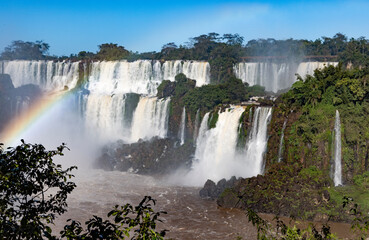 Fototapeta premium Iguazu Falls at Isla San Martin, one of the new seven natural wonders of the world in all its beauty viewed from the Argentinian side - traveling and exploring South America 