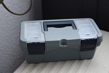 A close up shot gray toolbox
