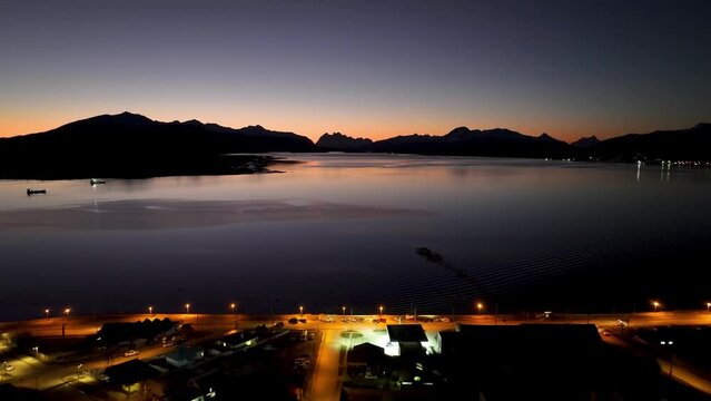 Sunset River Of Puerto Natales In Ultima Esperanza Chile. Nature Landscape. Travel Background. Ultima Esperanza Chile. Downtown Cityscape. Sunset River At Puerto Natales In Ultima Esperanza Chile.