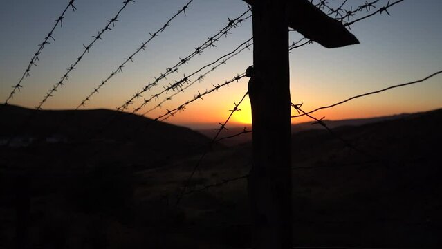 Barbed wire and border fence