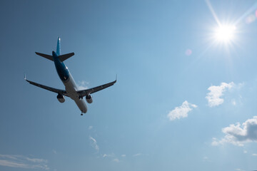 Airplane arriving in the sunset in Toronto Canada