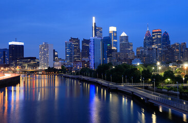 Philadelphia skyline at dusk with the Schuylkill River on the foreground, USA