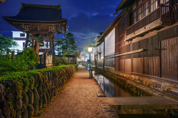 Hida, Gifu, Japan on Shirakabe Dozogai Street at night.