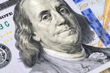 Obraz na płótnie Canvas close-up of one hundred American dollars with a portrait of the president