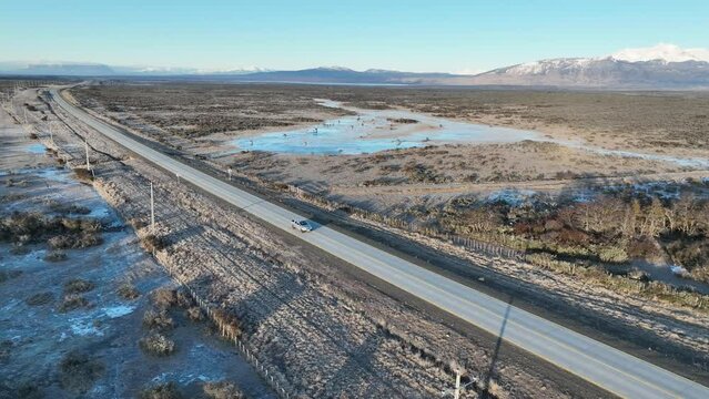 Scenic Road At Puerto Natales In Ultima Esperanza Chile. Snowy Mountains. Road Landscape. Ultima Esperanza Chile. Winter Background. Scenic Road At Puerto Natales In Ultima Esperanza Chile.
