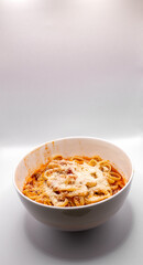 bowl of pasta on a white background 