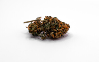 A piece of Cannabis on a white background 
