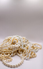 a pile of pearls on a white background 