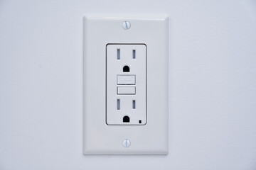 Tamper resistant GFCI Ground Fault Circuit Interrupter power outlet