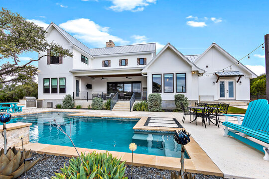 white house with pool 