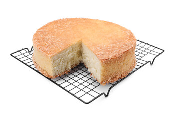 Baking rack with tasty sponge cake isolated on white