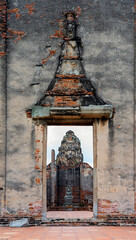 Old ruins and walls of red bricks in Ayutthaya, Thailand
