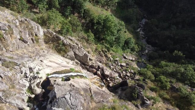 Aerial view over "Frecha da Mizarela" waterfall - the largest waterfall on the Iberian Peninsula. Serra da Freita, Portugal 2023.