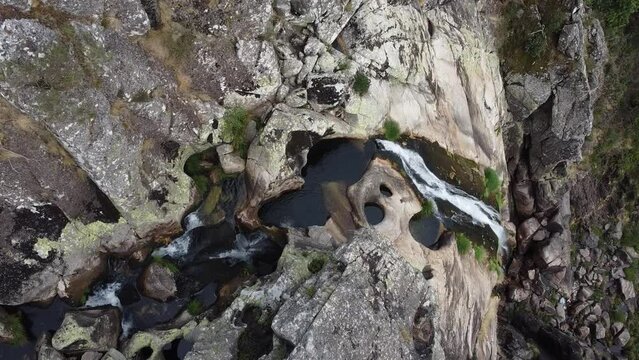 Aerial view over "Frecha da Mizarela" waterfall - the largest waterfall on the Iberian Peninsula. Serra da Freita, Portugal 2023.