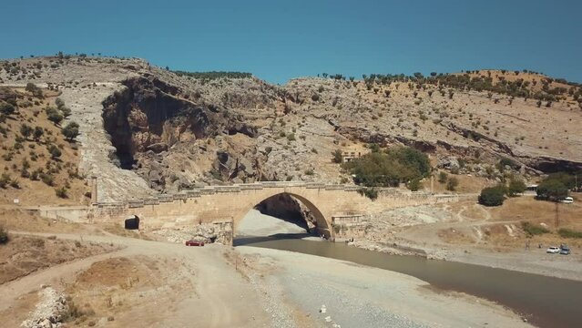 Aerial view of Severan Bridge and Chabinas creek at Adiyaman province, southeastern Anatolia, Turkey. Cendere bridge or Chabinas bridge is a late Roman bridge located near the ancient city of.