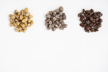 Chocolates pebble. Chocolate candies shaped rock.