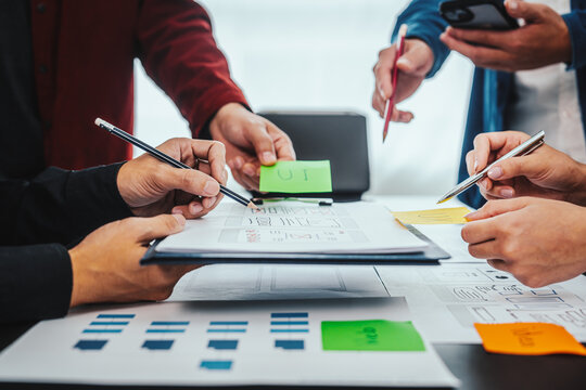 UI, UX designers developers Group team meeting often fill variety of roles in prototyping, product development and adds new ideas to mix, helps set stage for better collaboration during build phase.