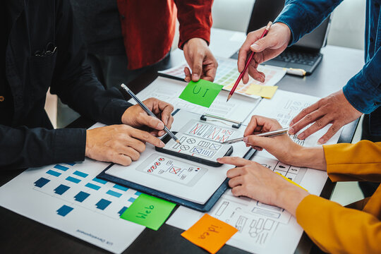 UI, UX designers developers Group team meeting often fill variety of roles in prototyping, product development and adds new ideas to mix, helps set stage for better collaboration during build phase.