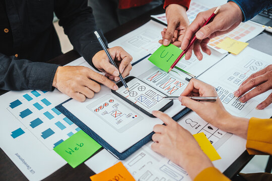 UI, UX designers developers Group team meeting often fill variety of roles in prototyping, product development and adds new ideas to mix, helps set stage for better collaboration during build phase.