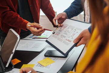 UI, UX designers developers Group team meeting often fill variety of roles in prototyping, product development and adds new ideas to mix, helps set stage for better collaboration during build phase.