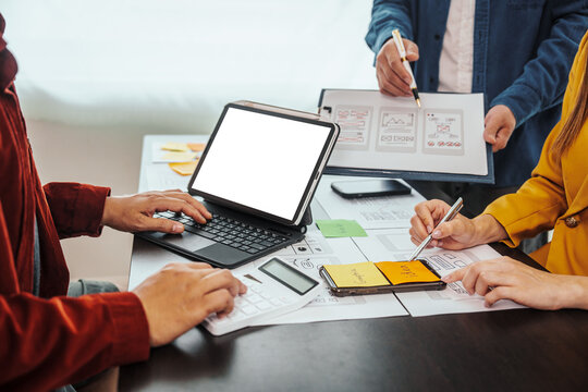 UI, UX designers developers Group team meeting often fill variety of roles in prototyping, product development and adds new ideas to mix, helps set stage for better collaboration during build phase.