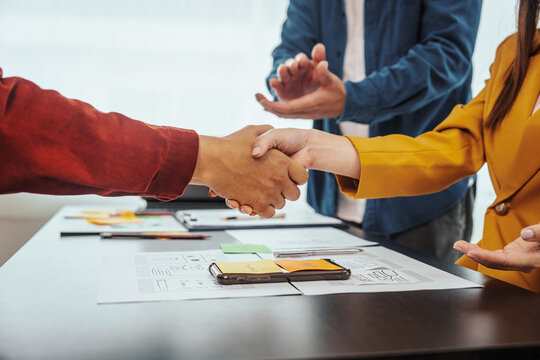 UI, UX designers developers Group team meeting often fill variety of roles in prototyping, product development and adds new ideas to mix, helps set stage for better collaboration during build phase.