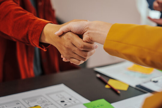 UI, UX designers developers Group team meeting often fill variety of roles in prototyping, product development and adds new ideas to mix, helps set stage for better collaboration during build phase.