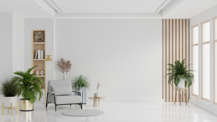 Modern minimalist interior with an armchair on empty white color wall background. © Vanitjan