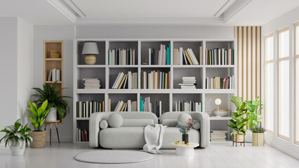 Library in the living room with gray sofa on empty light white color wall. © Vanitjan
