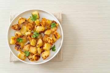Roasted or grilled potatoes  on plate